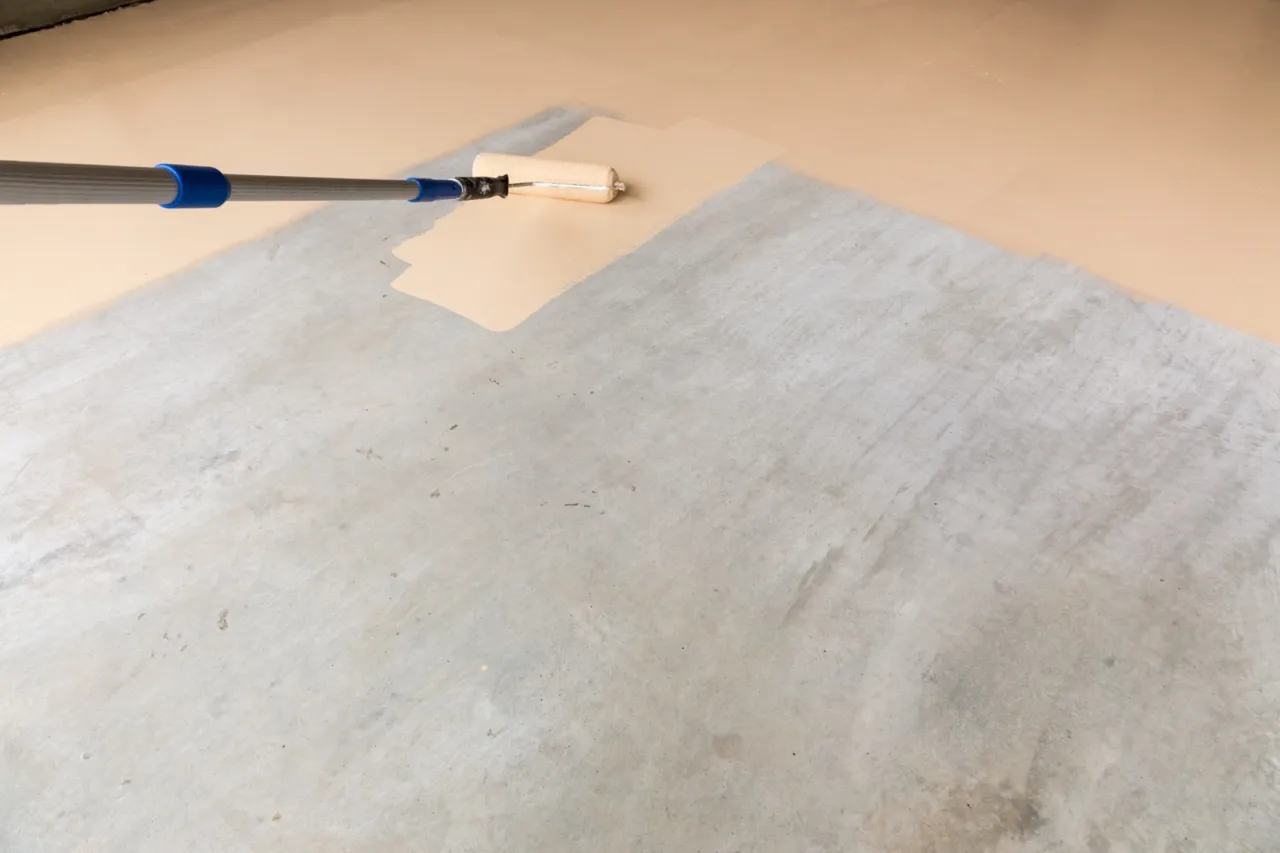 peinture sol béton, application peinture béton, peinture sol industriel, préparation sol béton, peinture époxy béton, peinture béton durable, entreprise peinture sol béton, peinture polyuréthane béton